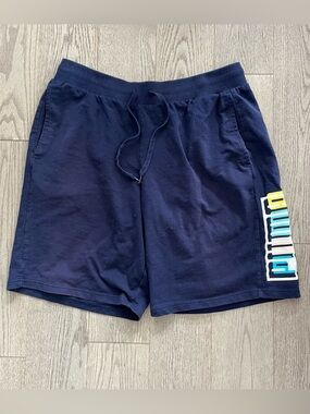 Puma Men's Navy Athletic Shorts with Side Logo Block in size XL